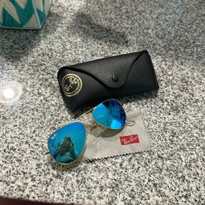 Ray-Ban Gold Aviator Sunglasses with Reflective Blue Lenses